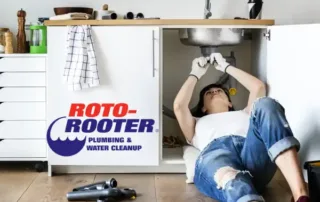Roto-Rooter Plumbing & Water Cleanup Drain Cleaning Service in action