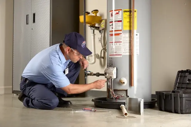 Roto-Rooter Plumber replacing water heater